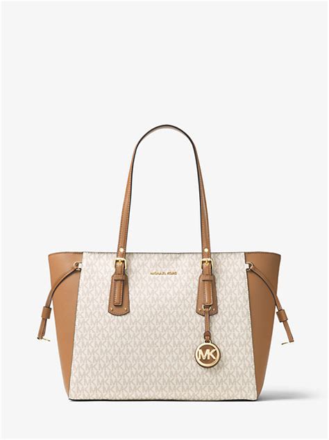 michael michael kors voyager medium logo mixed media tote bag|Michael Kors Tote with zipper.